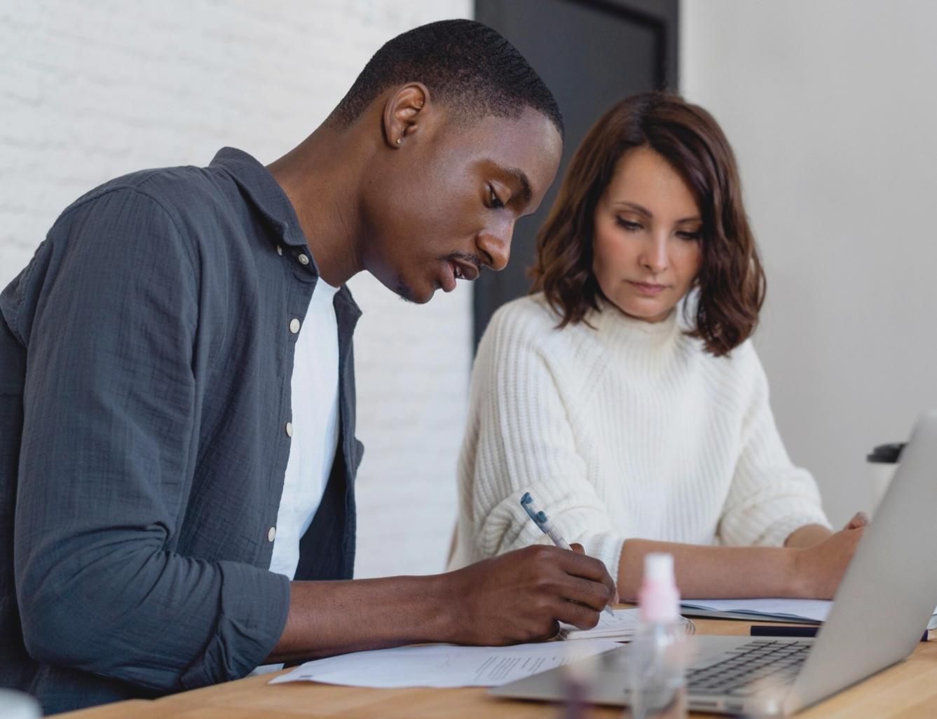 Business owner reviewing financial documents in regional Australian office